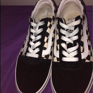 Black checkerboard vans